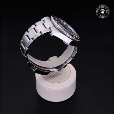 Rolex Certified Pre-owned GMT M116710LN-0001 front on black background