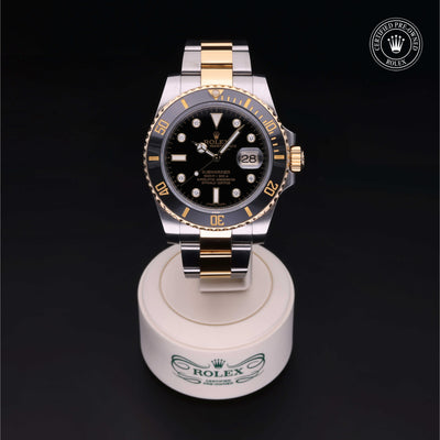 Rolex Certified Pre-owned Submariner Date M116613LN-0003 front on black background