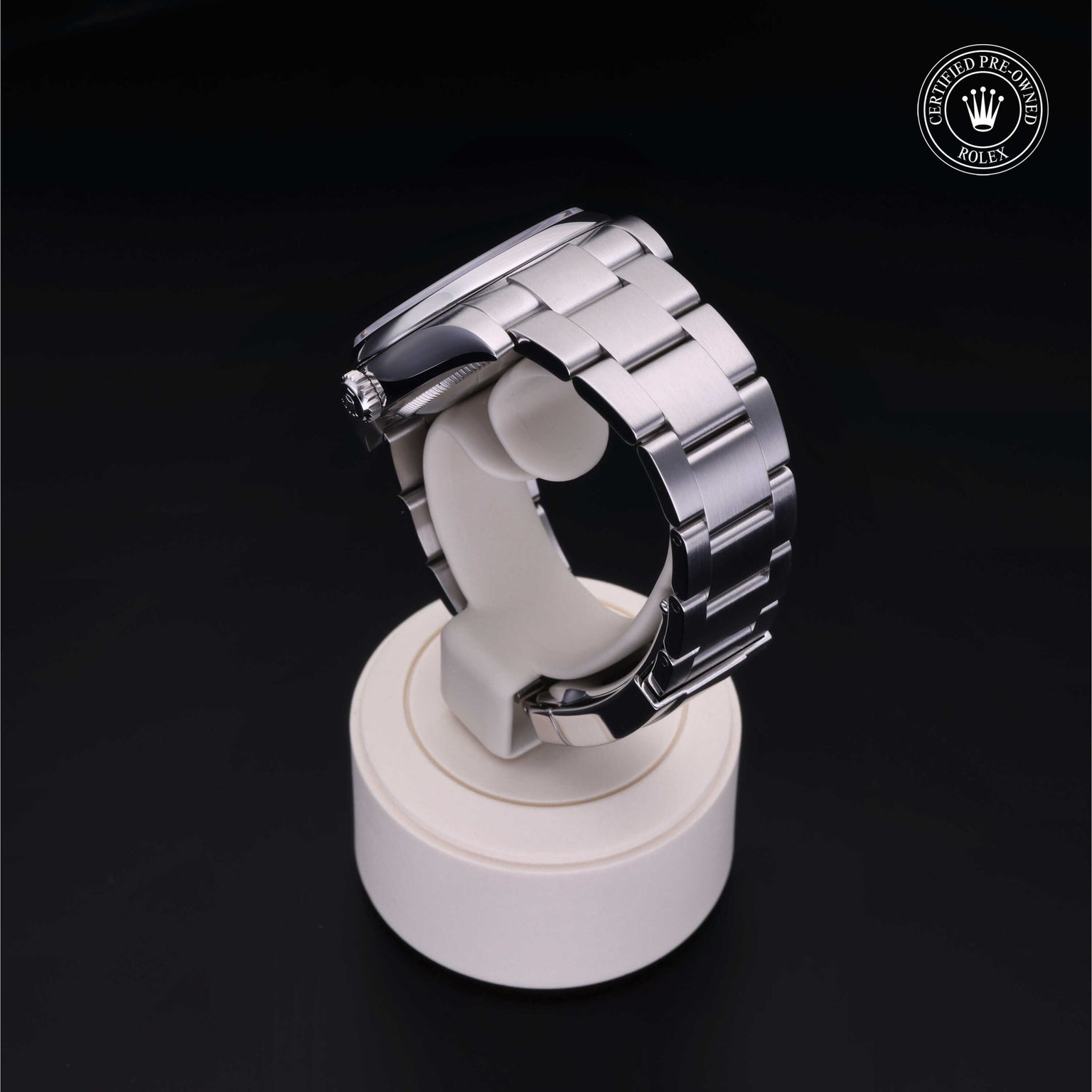 Rolex Certified Pre-owned Oyster Perpetual M116000-0010 front on black background