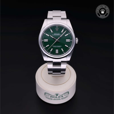 Rolex Certified Pre-owned Oyster Perpetual M124300-0005 front on black background