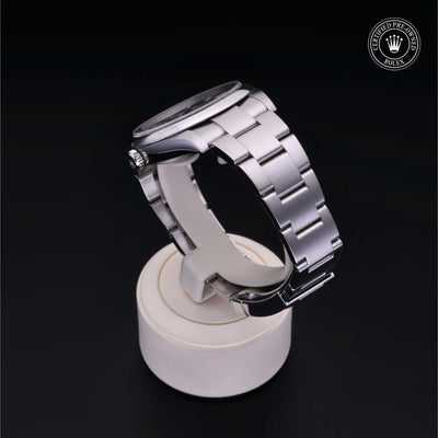 Rolex Certified Pre-owned Oyster Perpetual M124300-0005 front on black background