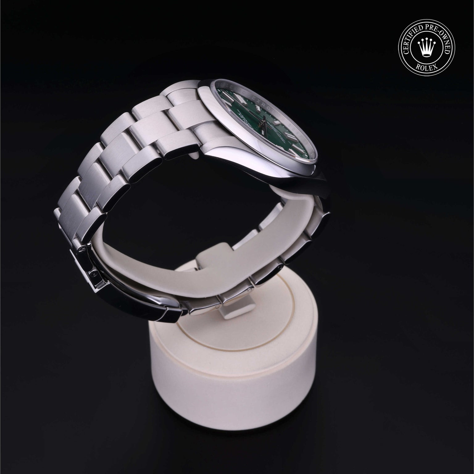 Rolex Certified Pre-owned Oyster Perpetual M124300-0005 front on black background