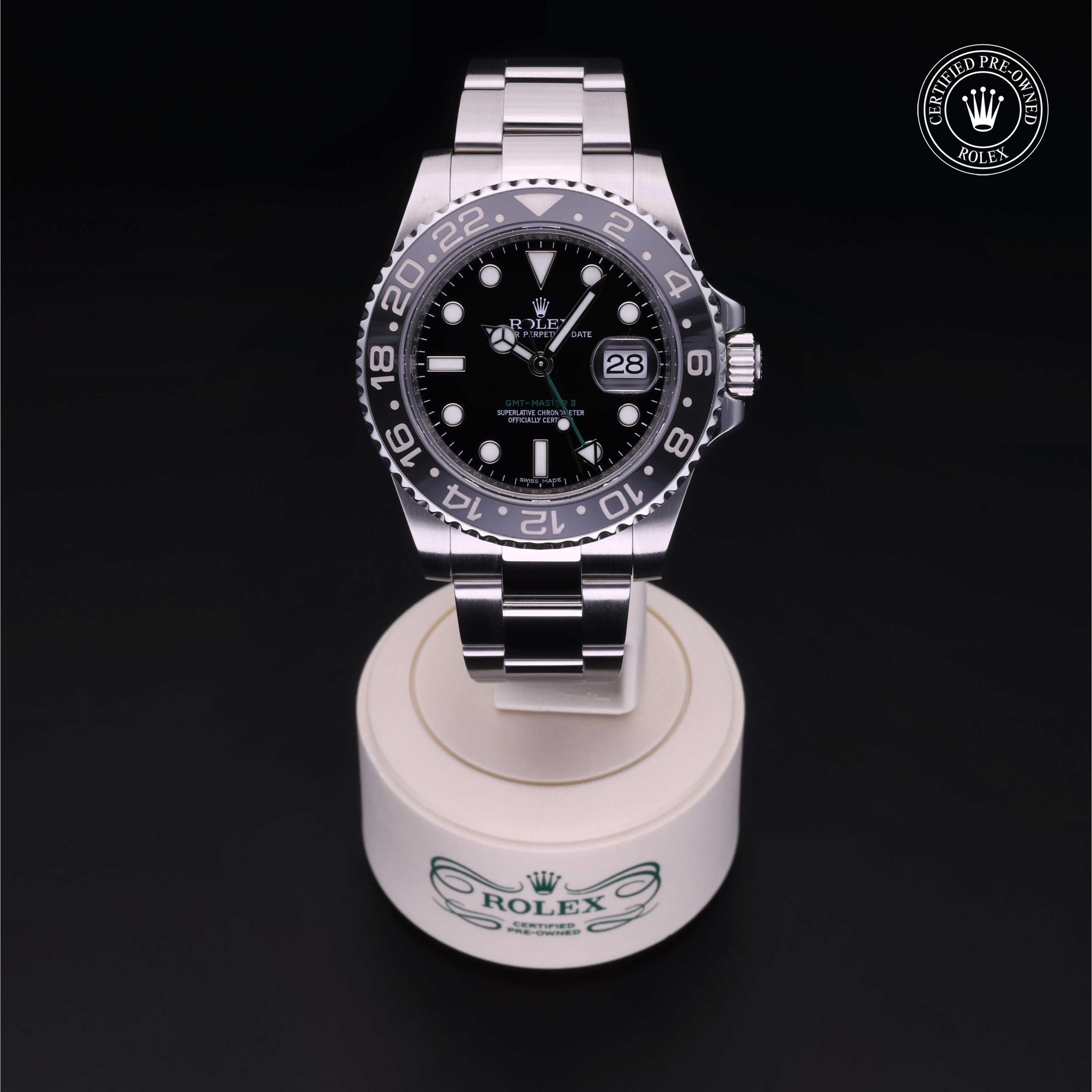 Rolex Certified Pre-owned GMT II M116710LN-0001 front on black background