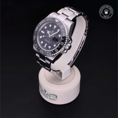 Rolex Certified Pre-owned GMT II M116710LN-0001 front on black background