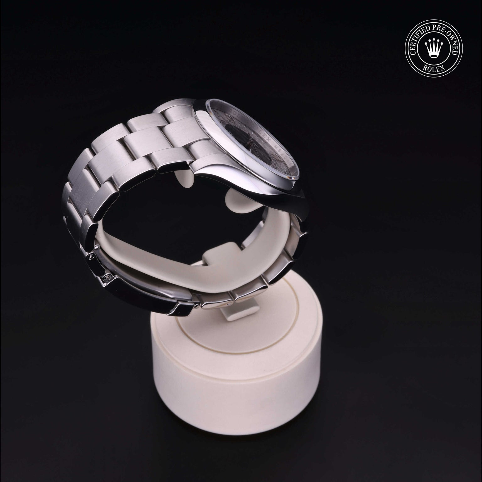 Rolex Certified Pre-owned Oyster Perpetual M116000-0004 front on black background