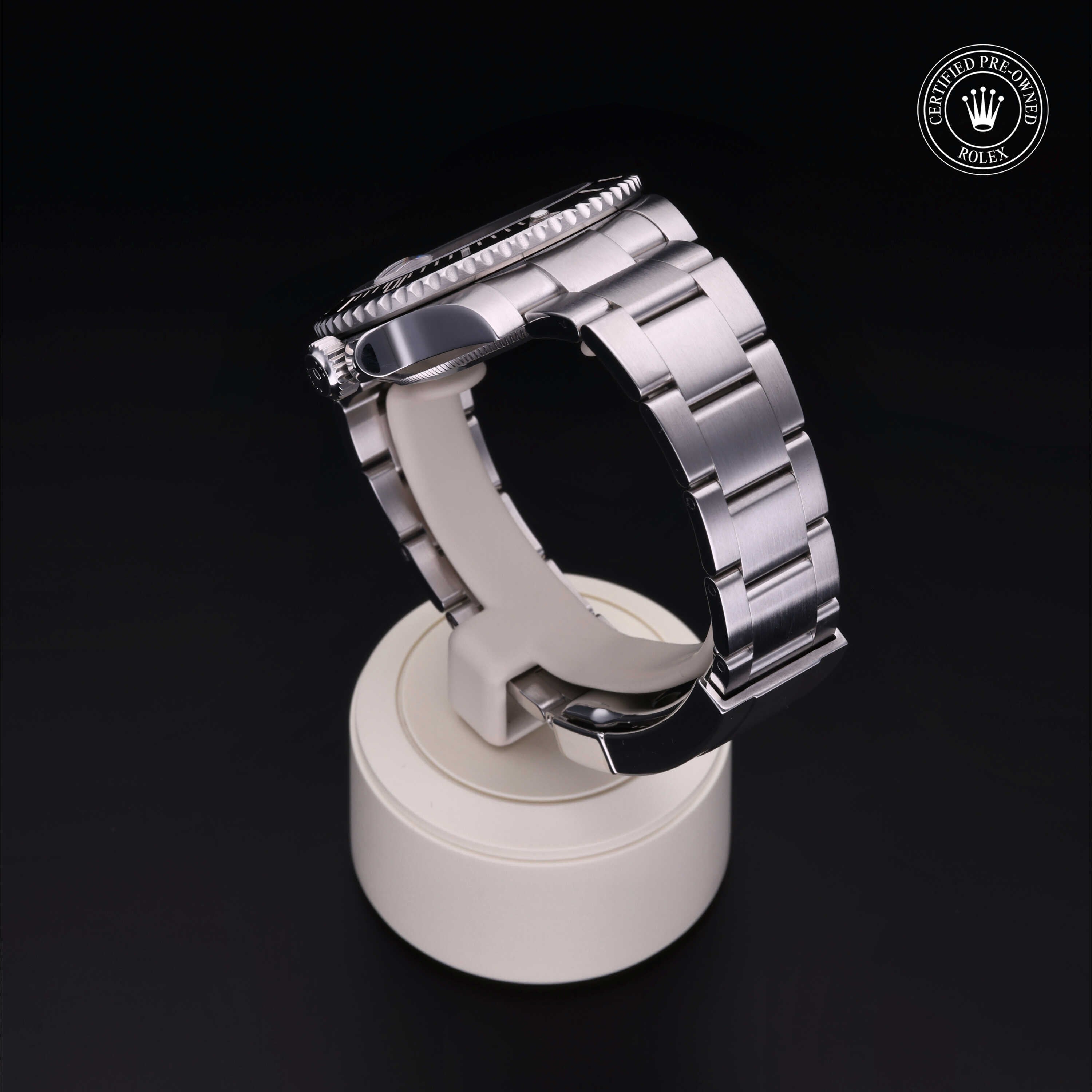 Rolex Certified Pre-owned Submariner Date M116610LN-0001 front on black background