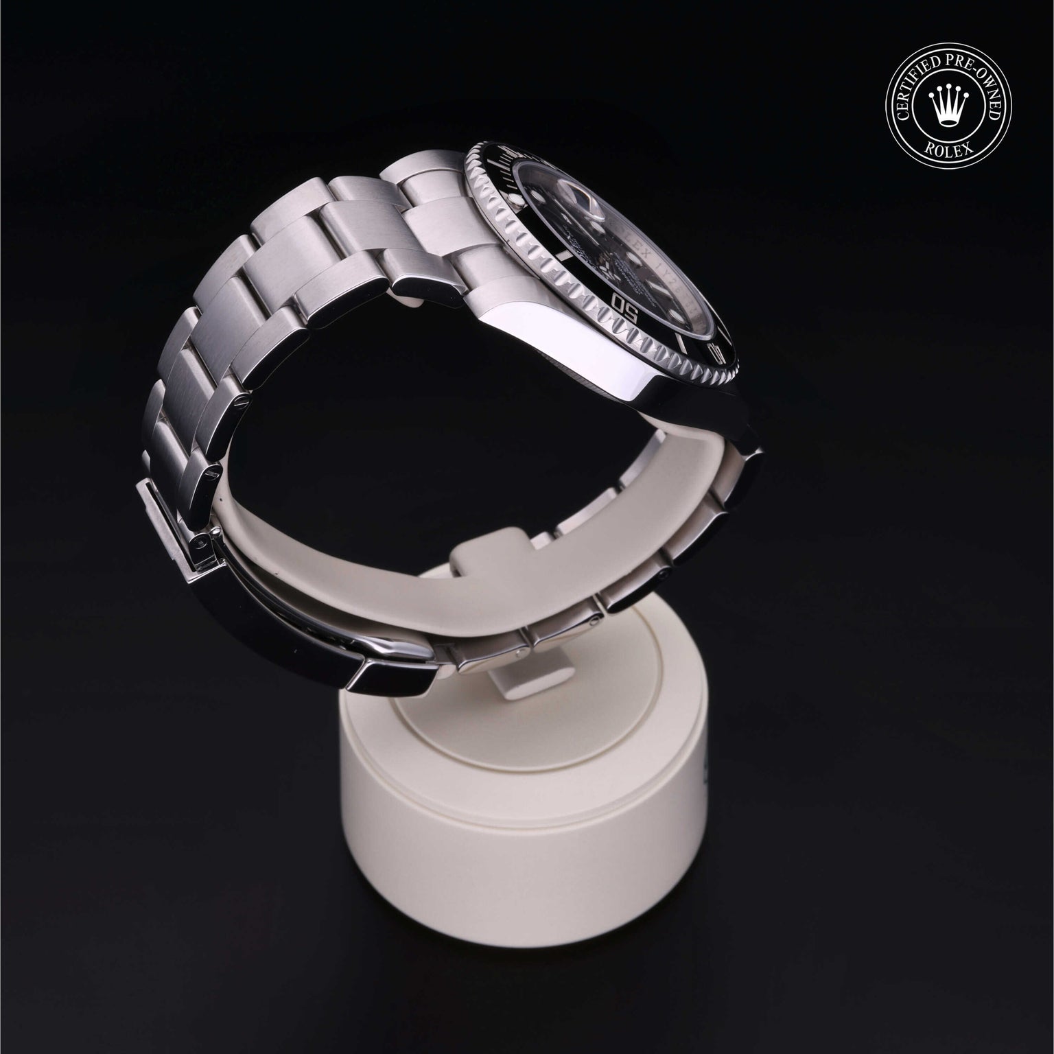 Rolex Certified Pre-owned Submariner Date M116610LN-0001 front on black background