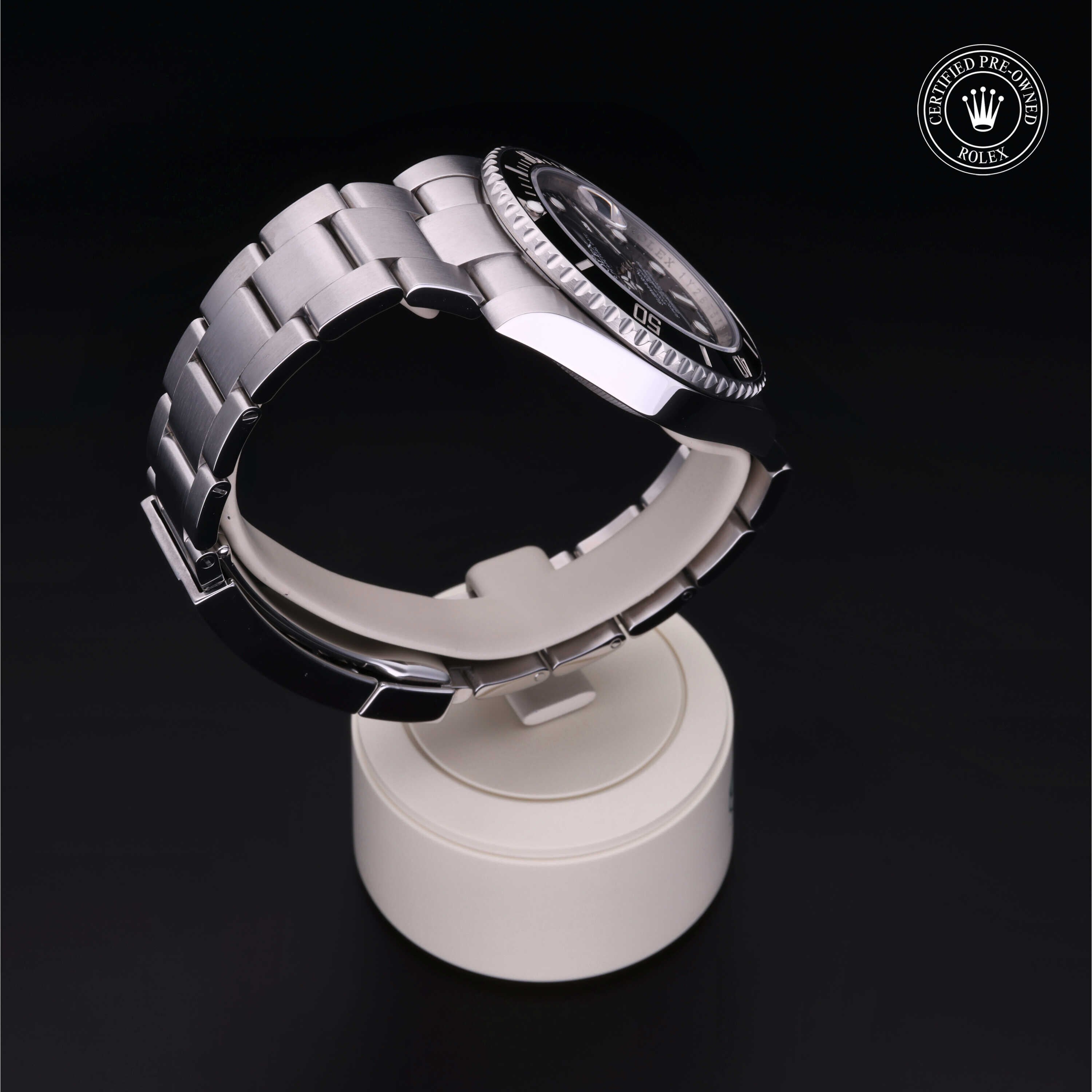 Rolex Certified Pre-owned Submariner Date M116610LN-0001 front on black background