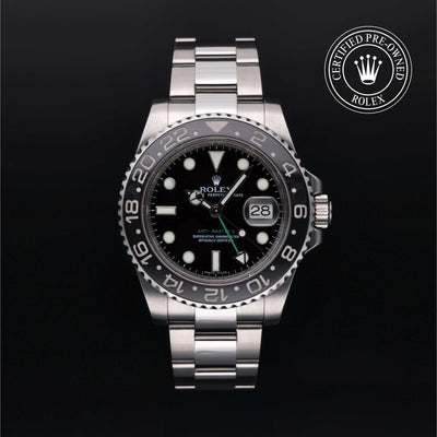 Rolex Certified Pre-owned GMT II M116710LN-0001 front on black background