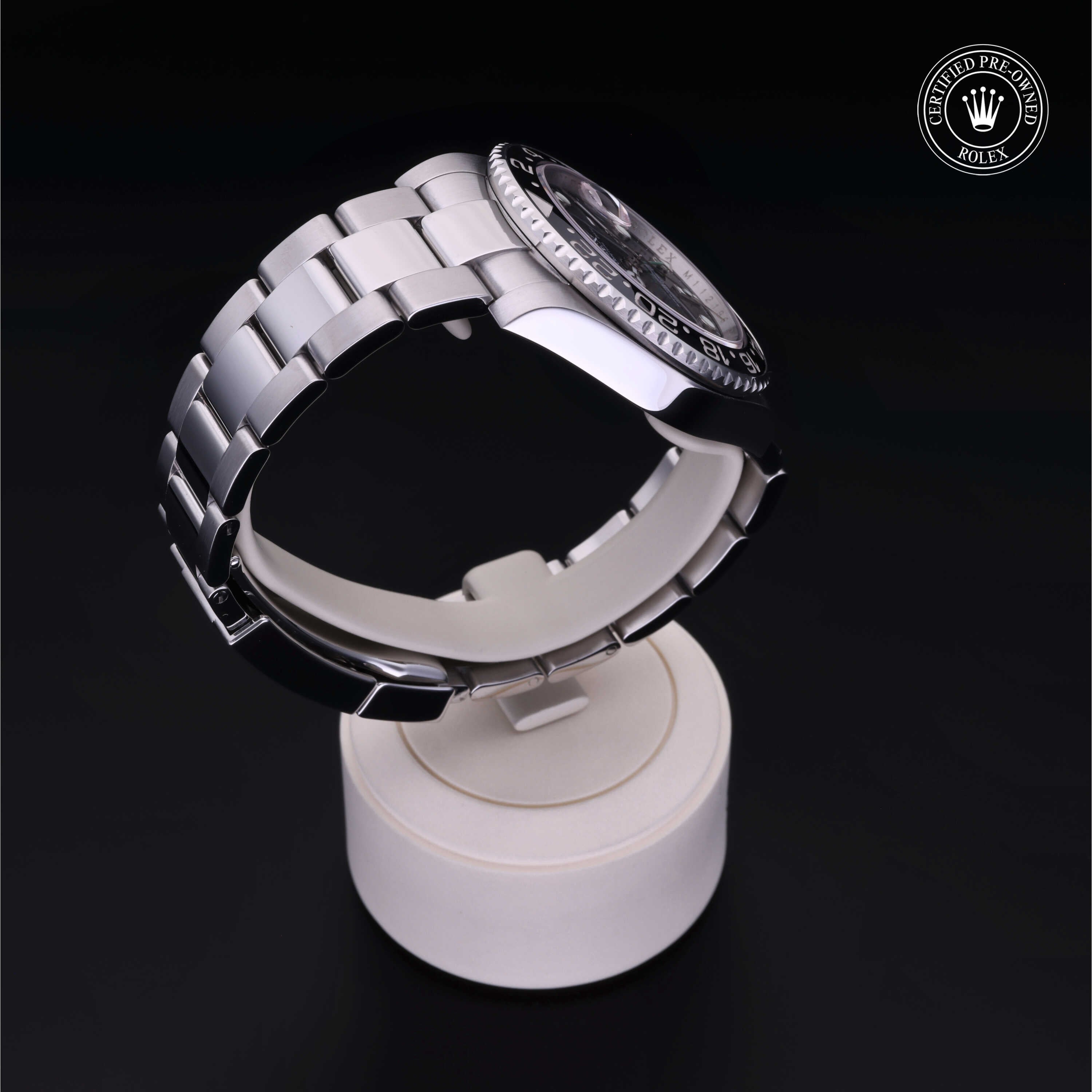 Rolex Certified Pre-owned GMT II M116710LN-0001 front on black background