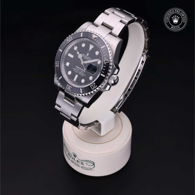 Rolex Certified Pre-owned Submariner M116610LN-0001 front on black background