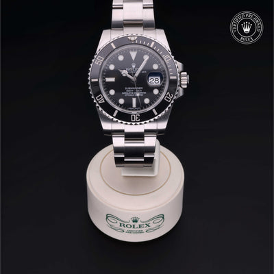 Rolex Certified Pre-owned Submariner M116610LN-0001 front on black background