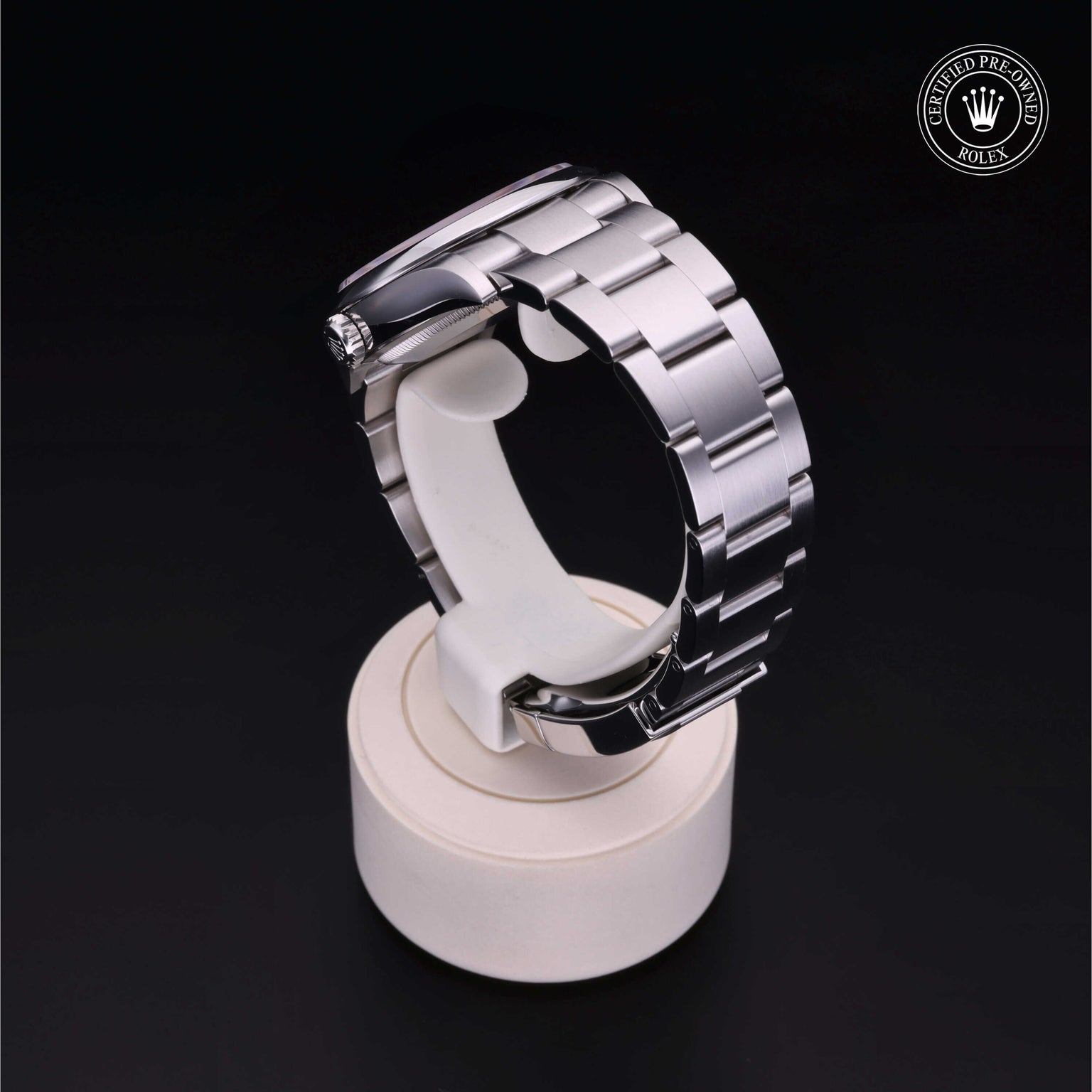 Rolex Certified Pre-owned Oyster Perpetual M126000-0007 front on black background