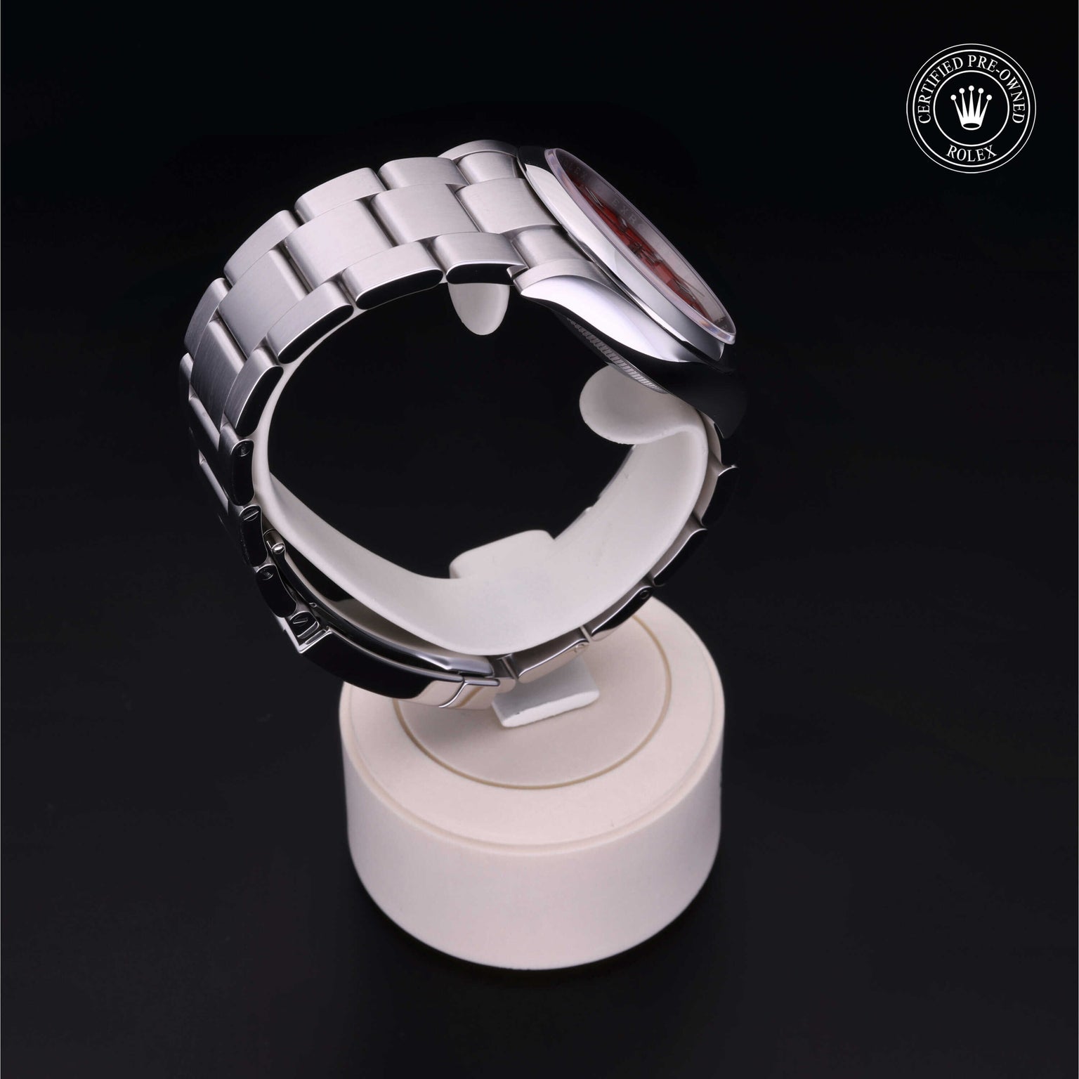 Rolex Certified Pre-owned Oyster Perpetual M126000-0007 front on black background