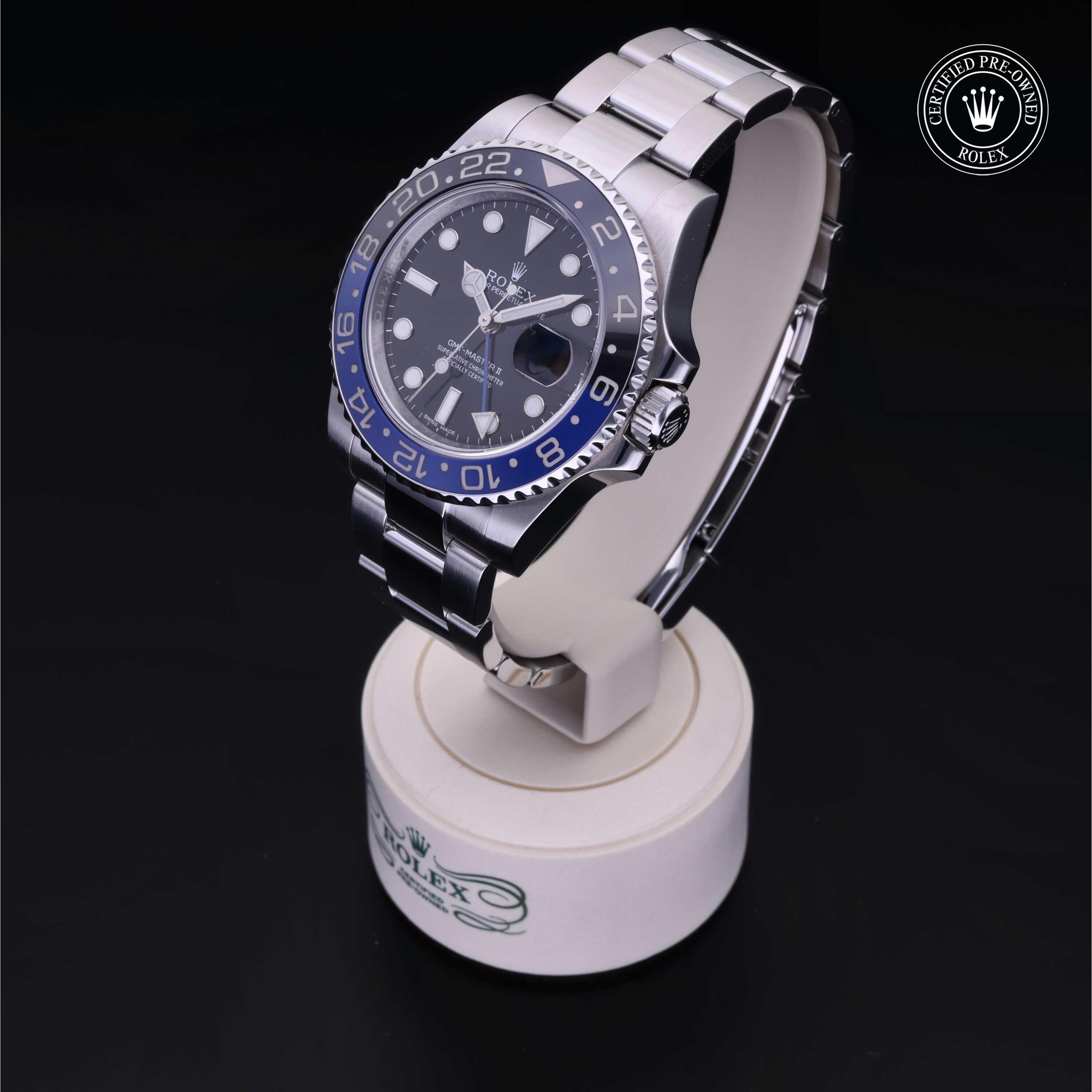 Rolex Certified Pre-owned GMT II M116710BLNR-0002 front on black background