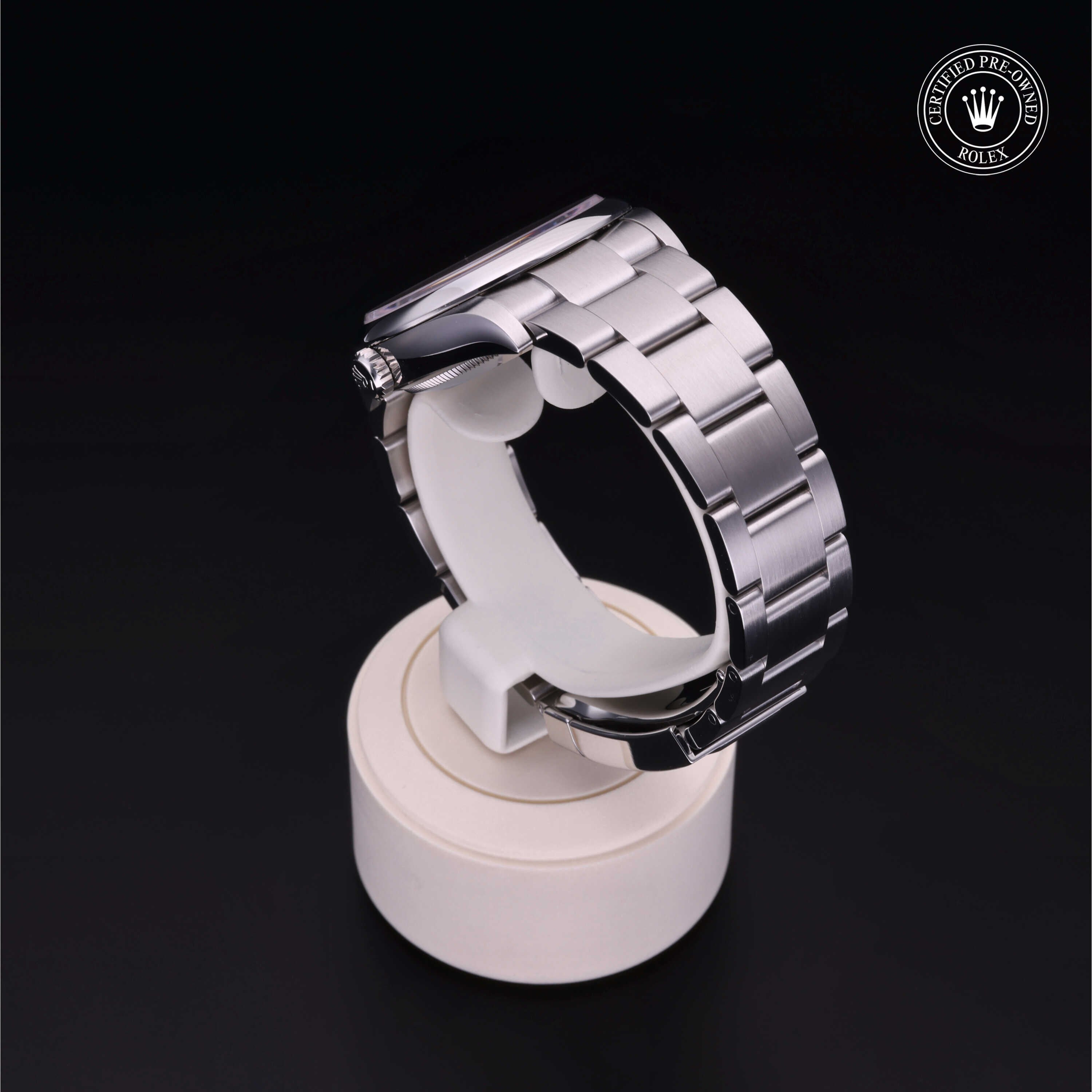 Rolex Certified Pre-owned Oyster Perpetual M126000-0007 front on black background