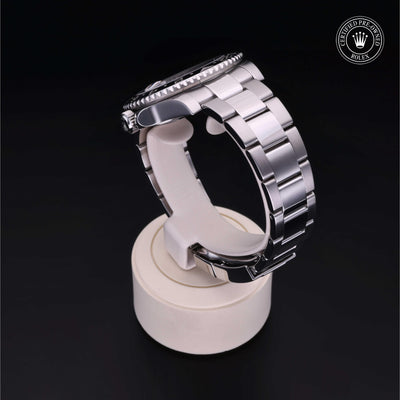 Rolex CPO GMT II M116710LN front on white background