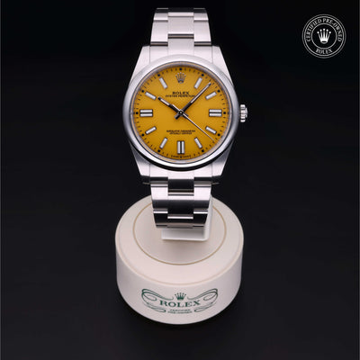 Rolex Certified Pre-owned Oyster Perpetual M124300-0004 front on black background
