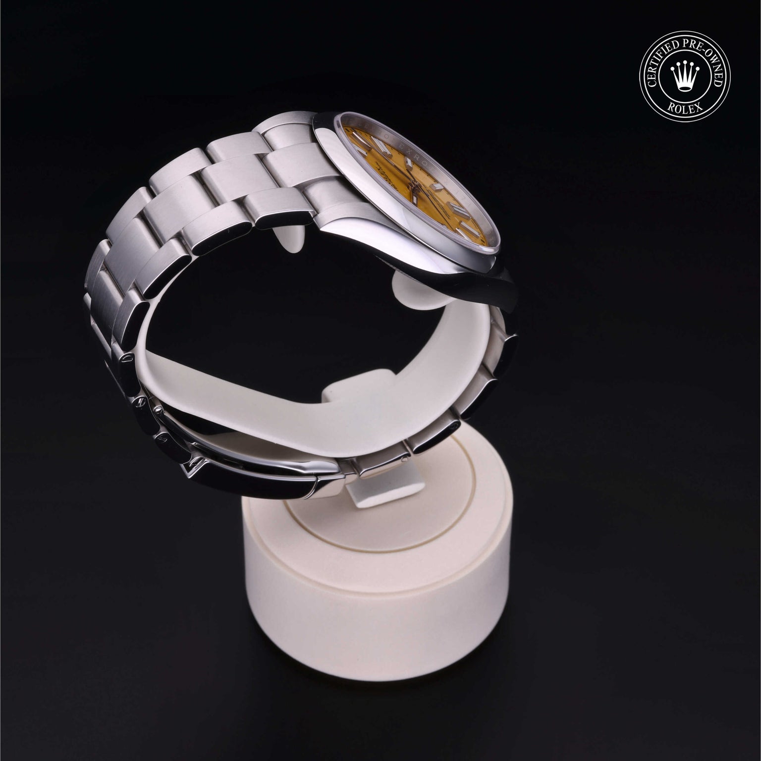 Rolex Certified Pre-owned Oyster Perpetual M124300-0004 front on black background