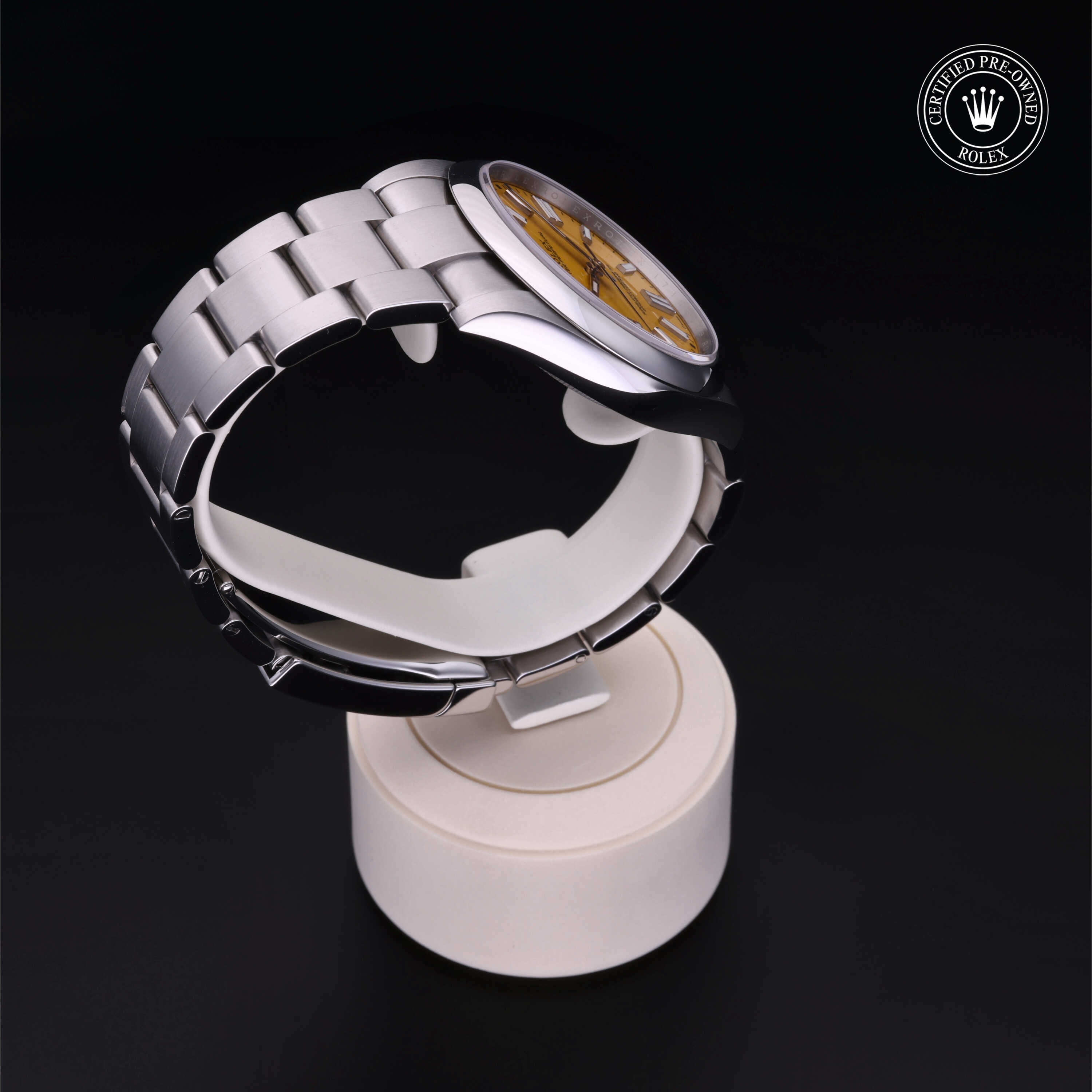 Rolex Certified Pre-owned Oyster Perpetual M124300-0004 front on black background