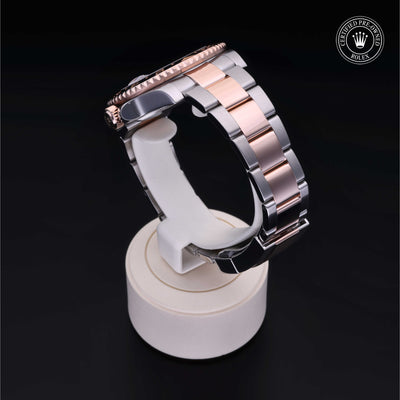 Rolex Certified Pre-owned GMT M126711CHNR-0002 front on black background