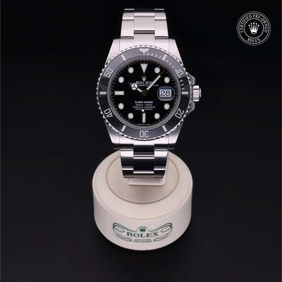 Rolex Certified Pre-owned Submariner M126610LN-0001 front on black background