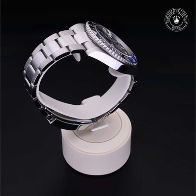 Rolex Certified Pre-owned GMT M126710BLNR-0003 front on black background