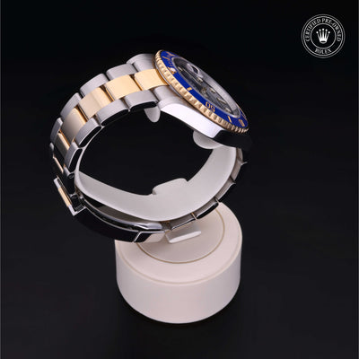 Rolex Certified Pre-owned Submariner M126613LB-0002 front on black background