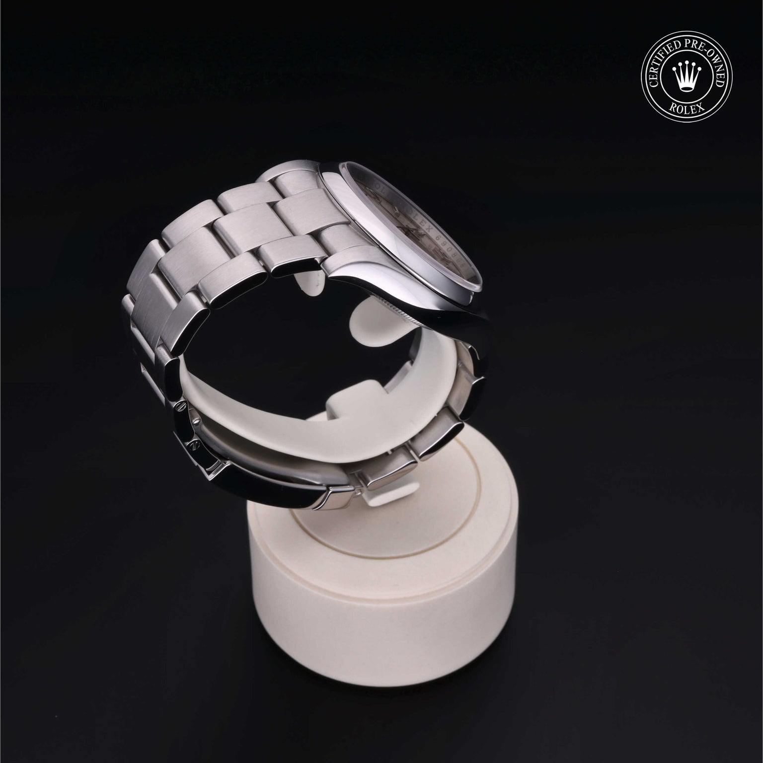 Rolex Certified Pre-owned Oyster Perpetual M116000-0001 front on black background