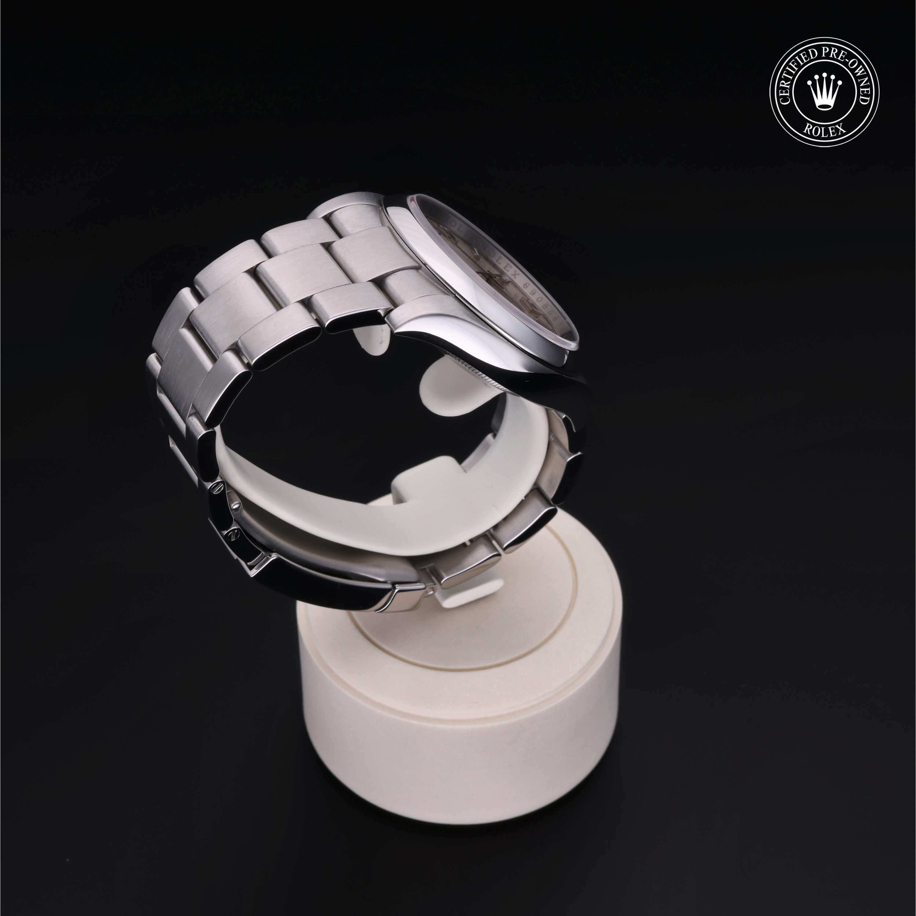 Rolex Certified Pre-owned Oyster Perpetual M116000-0001 front on black background