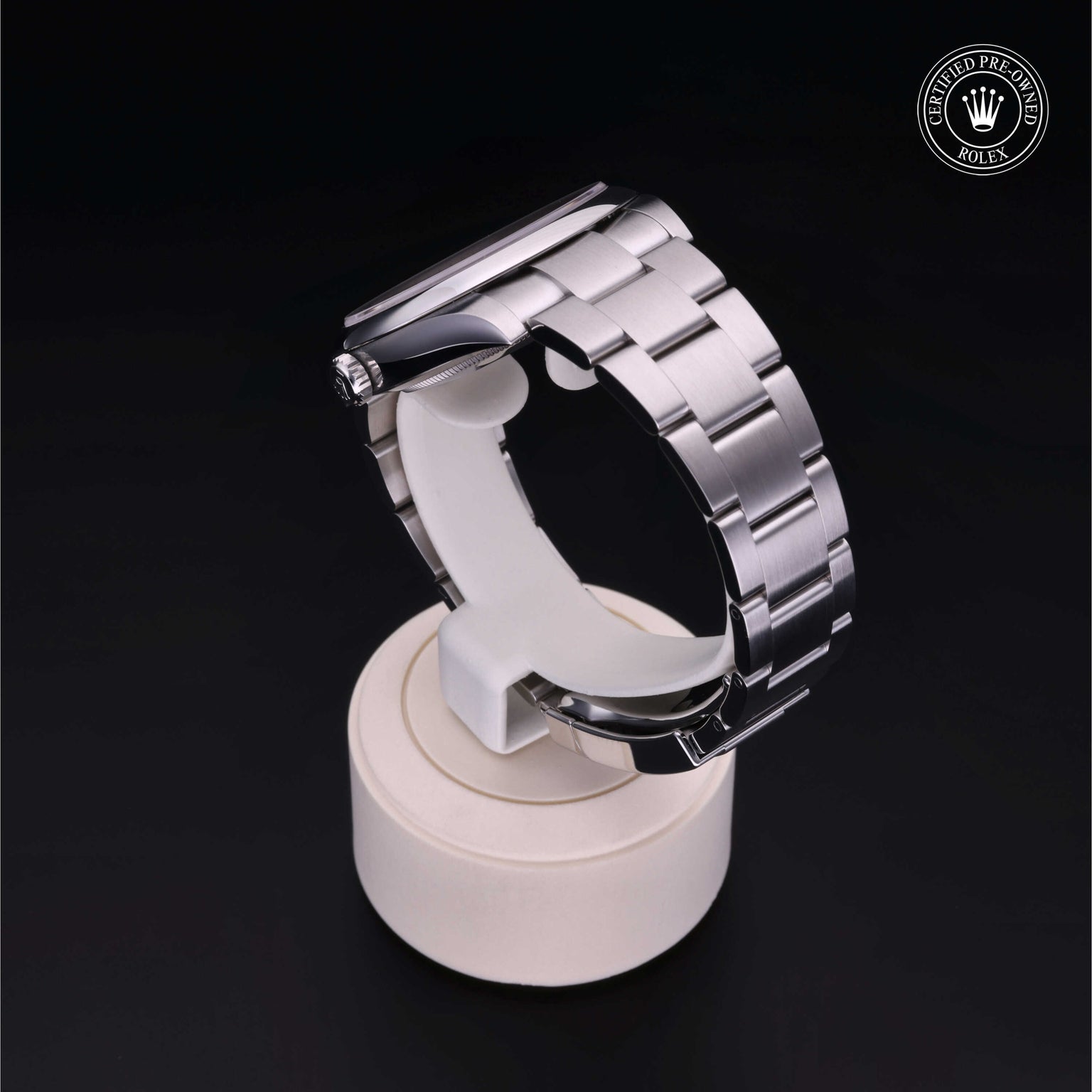 Rolex Certified Pre-owned Oyster Perpetual M124300-0004 front on black background