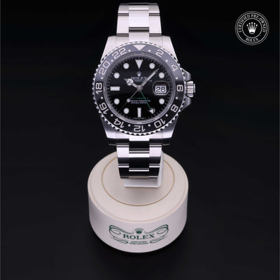 Rolex Certified Pre-owned GMT M116710LN-0001 front on black background