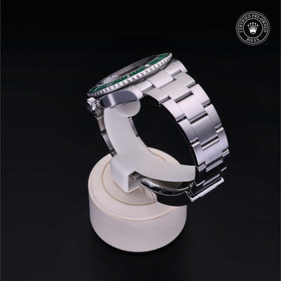 Rolex Certified Pre-owned Submariner M126610LV-0002 front on black background