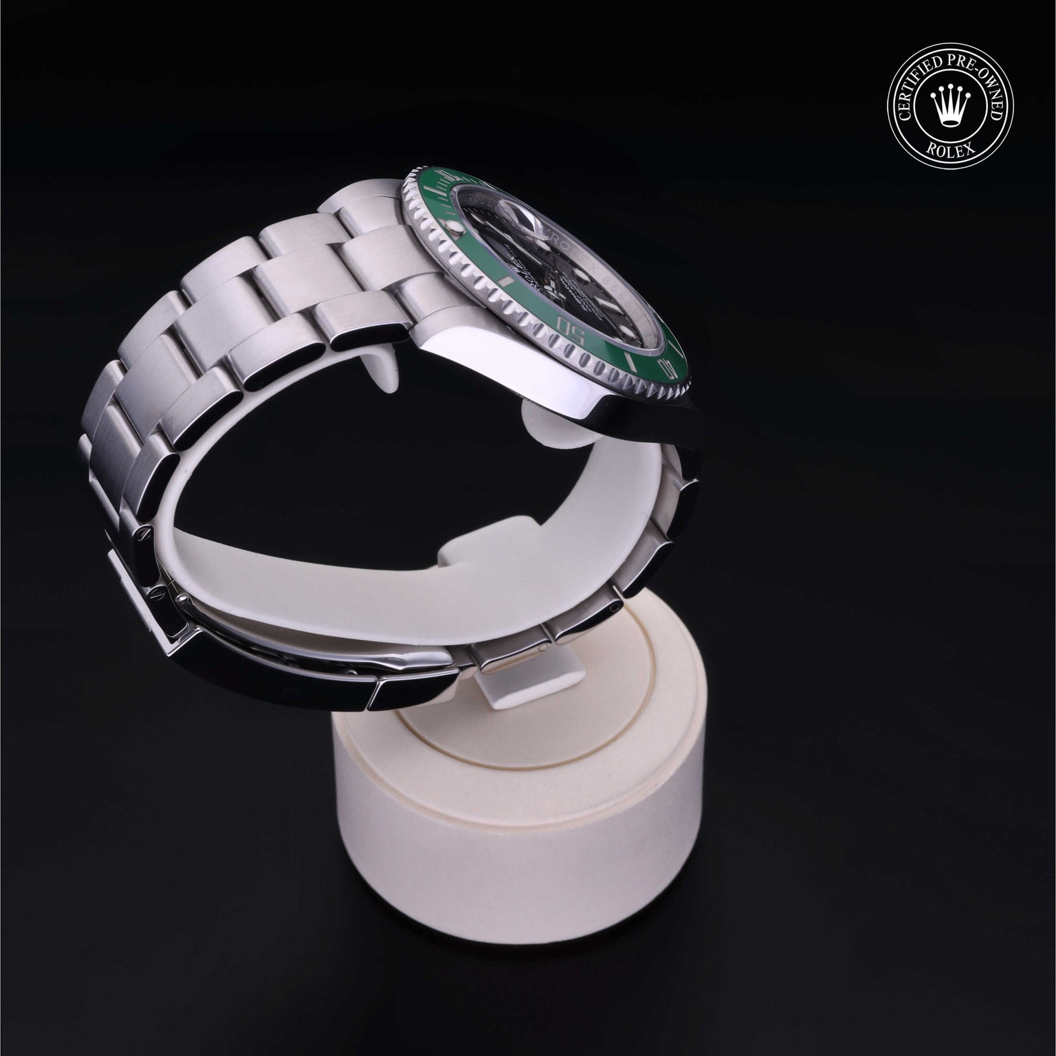 Rolex Certified Pre-owned Submariner M126610LV-0002 front on black background