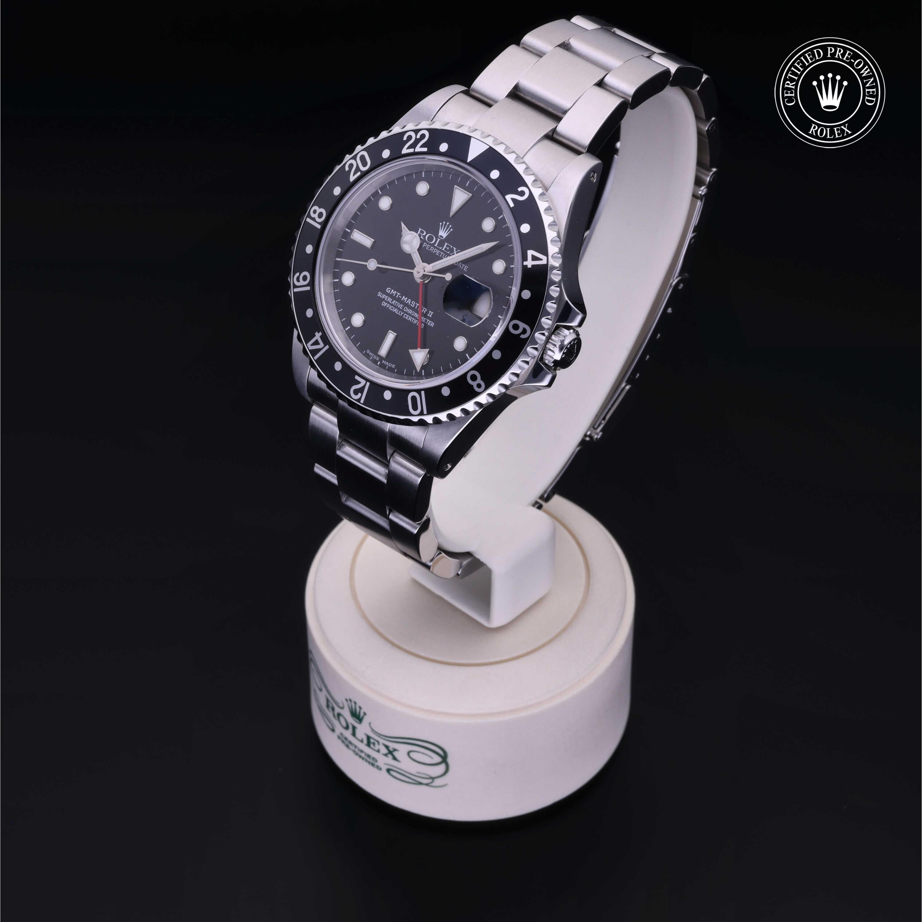 Rolex Certified Pre-owned GMT M16710LN-0004 front on black background