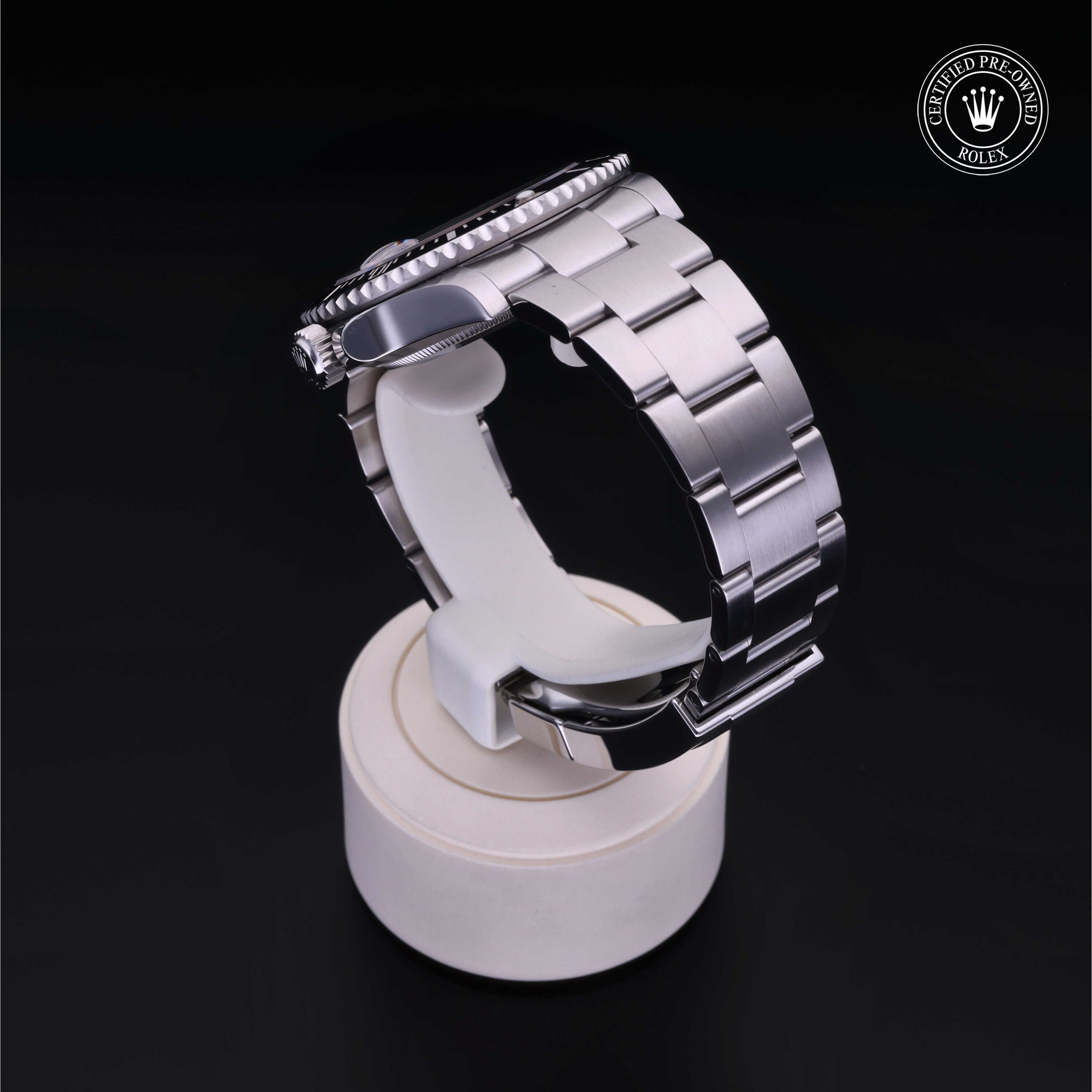 Rolex Certified Pre-owned Submariner M126610LN-0001 front on black background