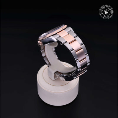 Rolex Certified Pre-owned Datejust M126231-0016 front on black background