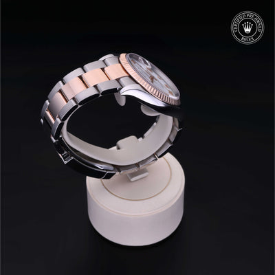 Rolex Certified Pre-owned Datejust M126231-0016 front on black background