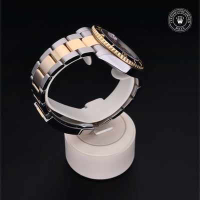 Rolex Certified Pre-owned Submariner M116613LN-0001 front on black background