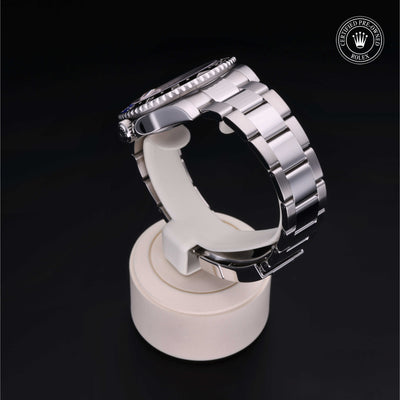 Rolex Certified Pre-owned GMT M116710BLNR-0002 front on black background