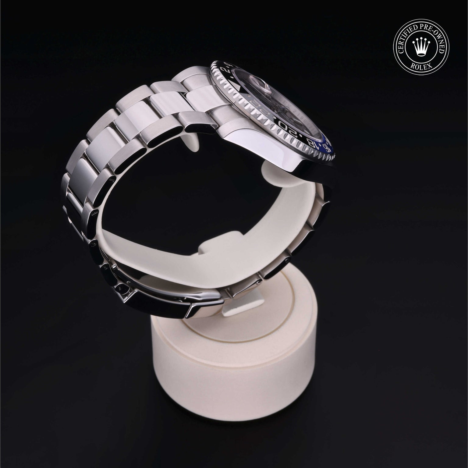 Rolex Certified Pre-owned GMT M116710BLNR-0002 front on black background