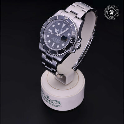 Rolex Certified Pre-owned Submariner M116610LN-0001 front on black background