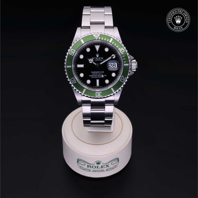 Rolex Certified Pre-owned Submariner M16610LV-0002 front on black background