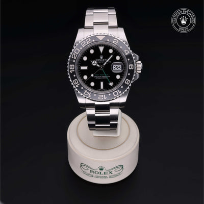 Rolex Certified Pre-owned GMT M116710LN-0001 front on black background