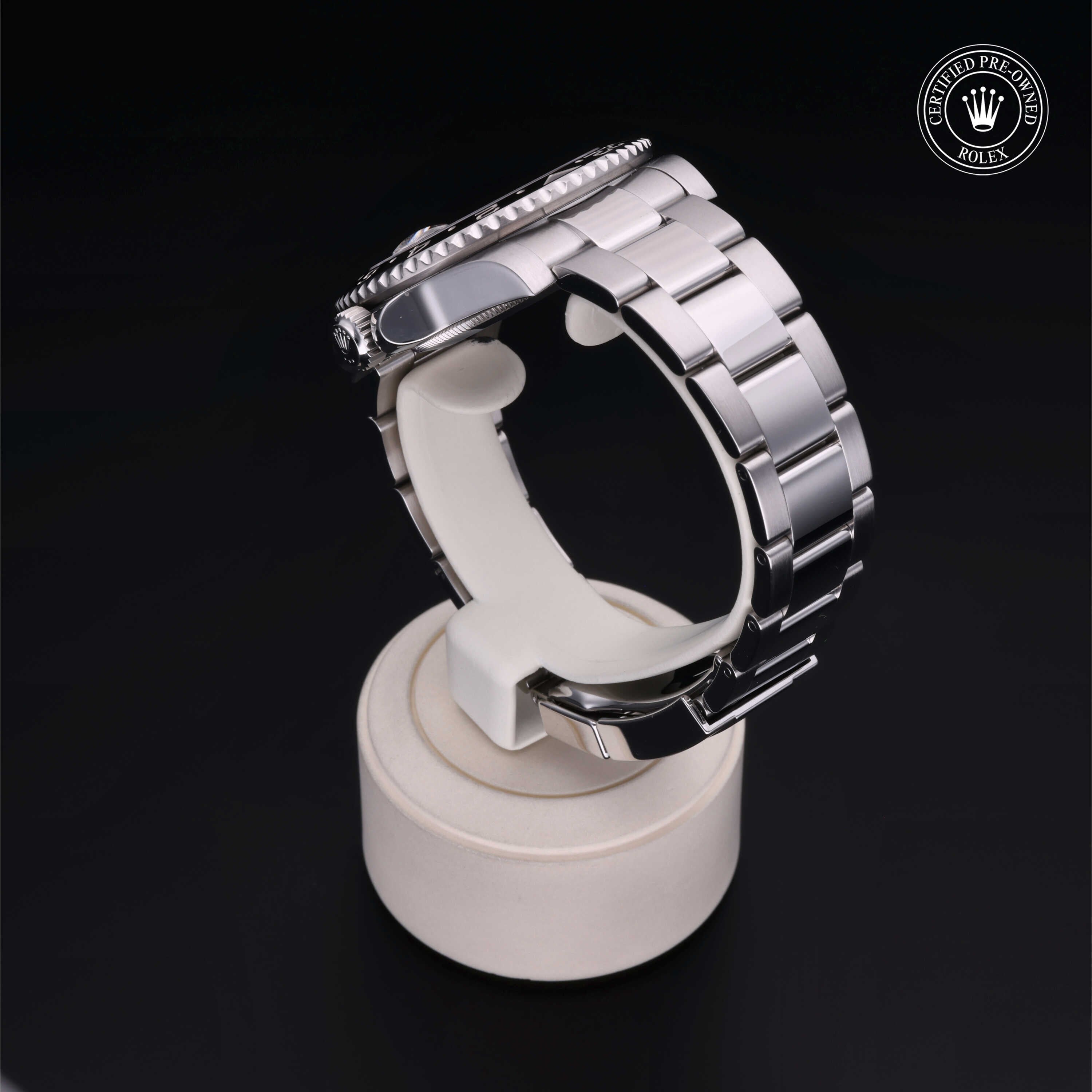 Rolex Certified Pre-owned GMT M116710LN-0001 front on black background