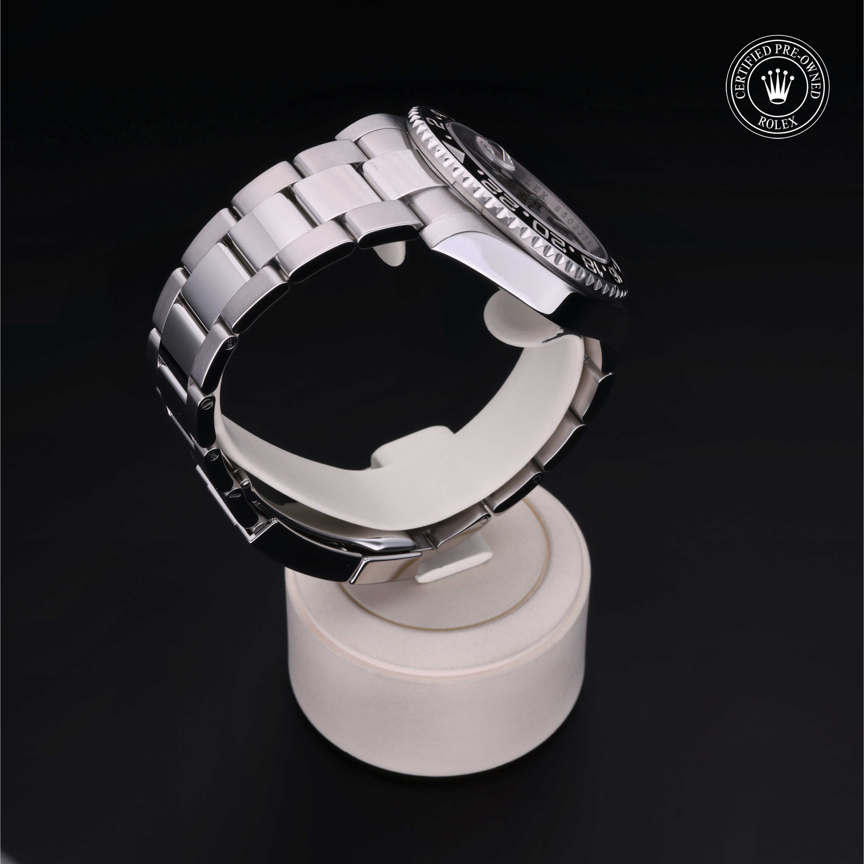 Rolex Certified Pre-owned GMT M116710LN-0001 front on black background