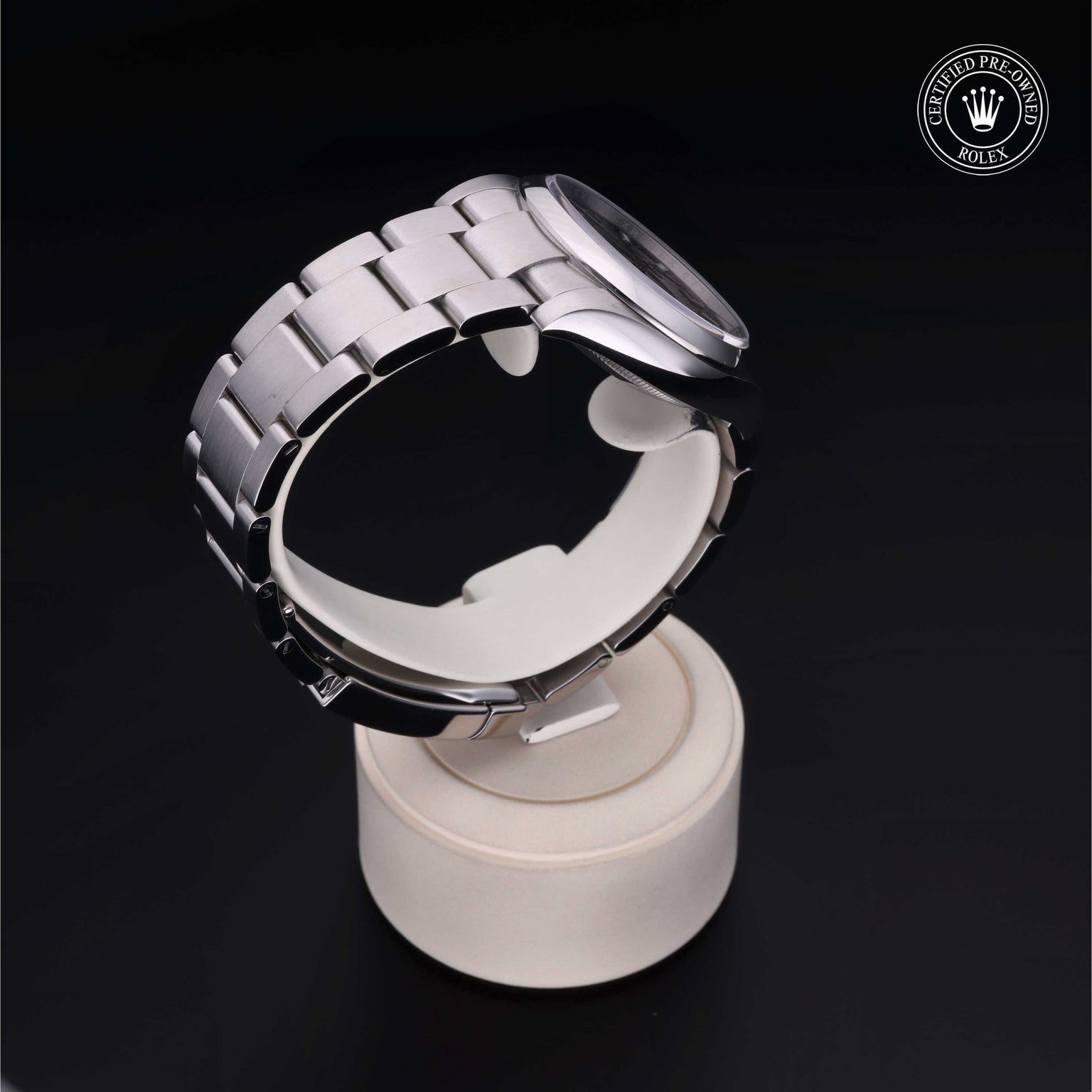 Rolex Certified Pre-owned Oyster Perpetual M114200-0014 front on black background