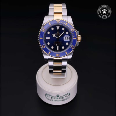 Rolex Certified Pre-owned Submariner M116613LB-0005 front on black background