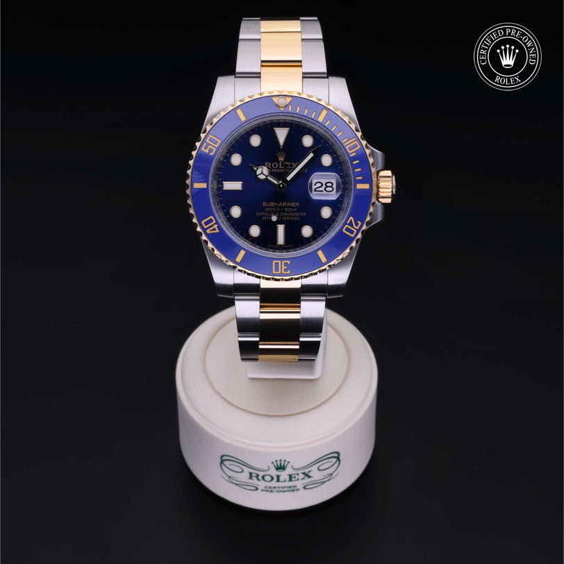 Rolex Certified Pre-owned Submariner M116613LB-0005 front on black background
