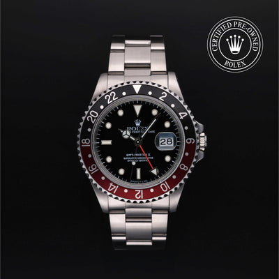 Rolex Certified Pre-owned GMT M16710-0009 front on black background